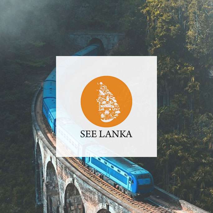 See Lanka tourism logo displayed over a scenic train bridge surrounded by lush forest.