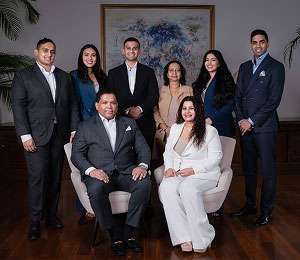 Hands Group senior management team portrait in formal business attire